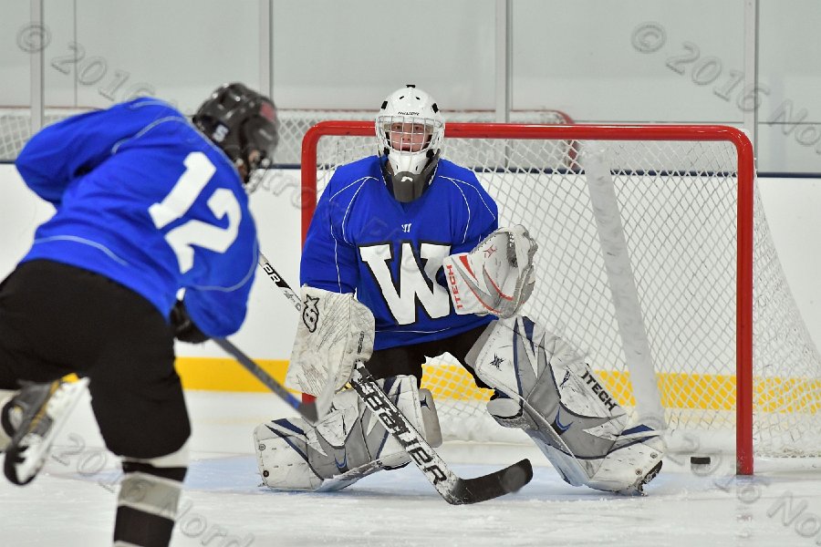 Wheaton College Men\'s Ice Hockey vs Middlesex Community College. - Photo By: KEITH NORDSTROM